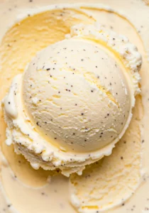 Rich vanilla bean gelato scoop with natural vanilla flecks